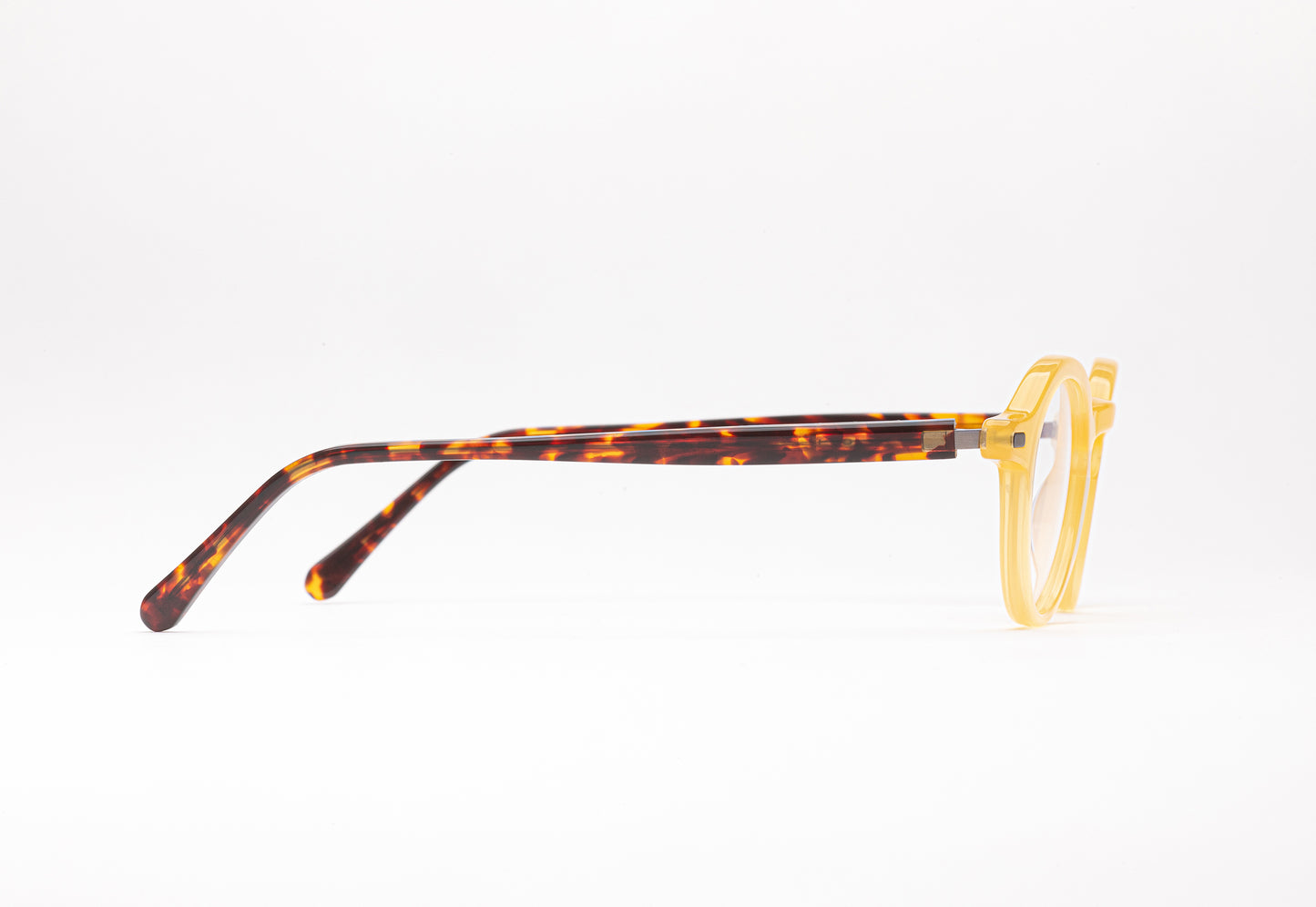 Side view of The Explorer yellow glasses with tortoiseshell stems