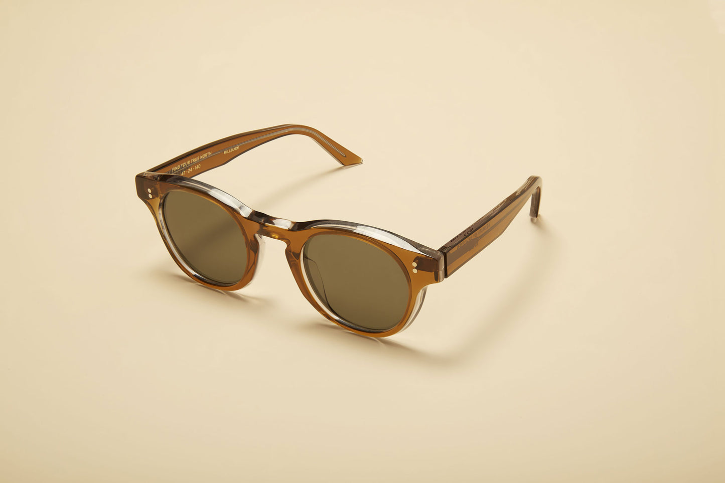 Round brown designer sunglasses