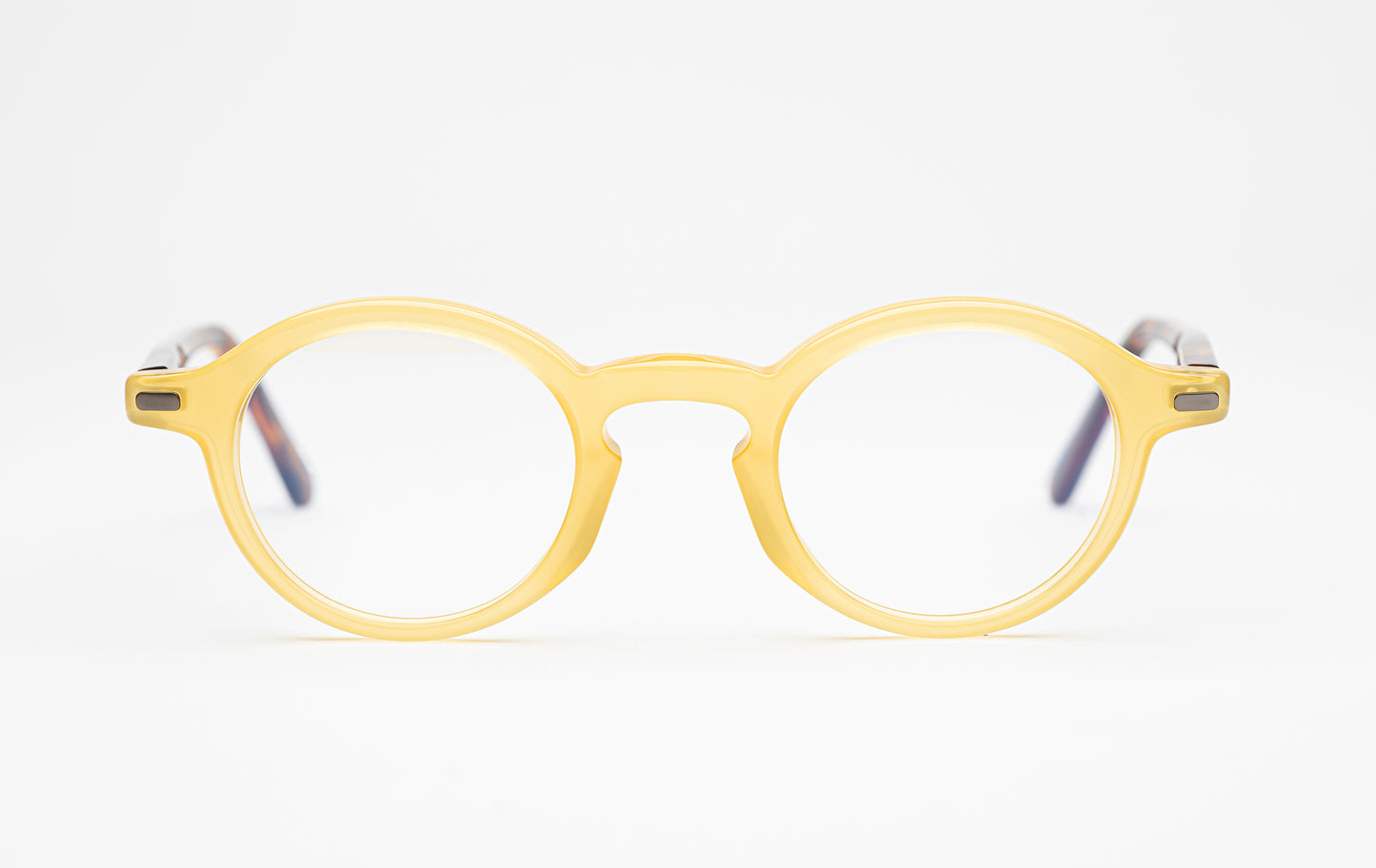Front view of The Explorer yellow glasses with tortoiseshell stems