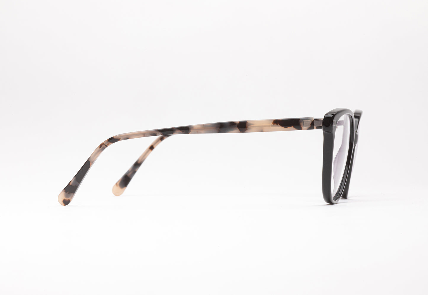 Side view of The Humanist black acetate glasses frames with tortoiseshell stems
