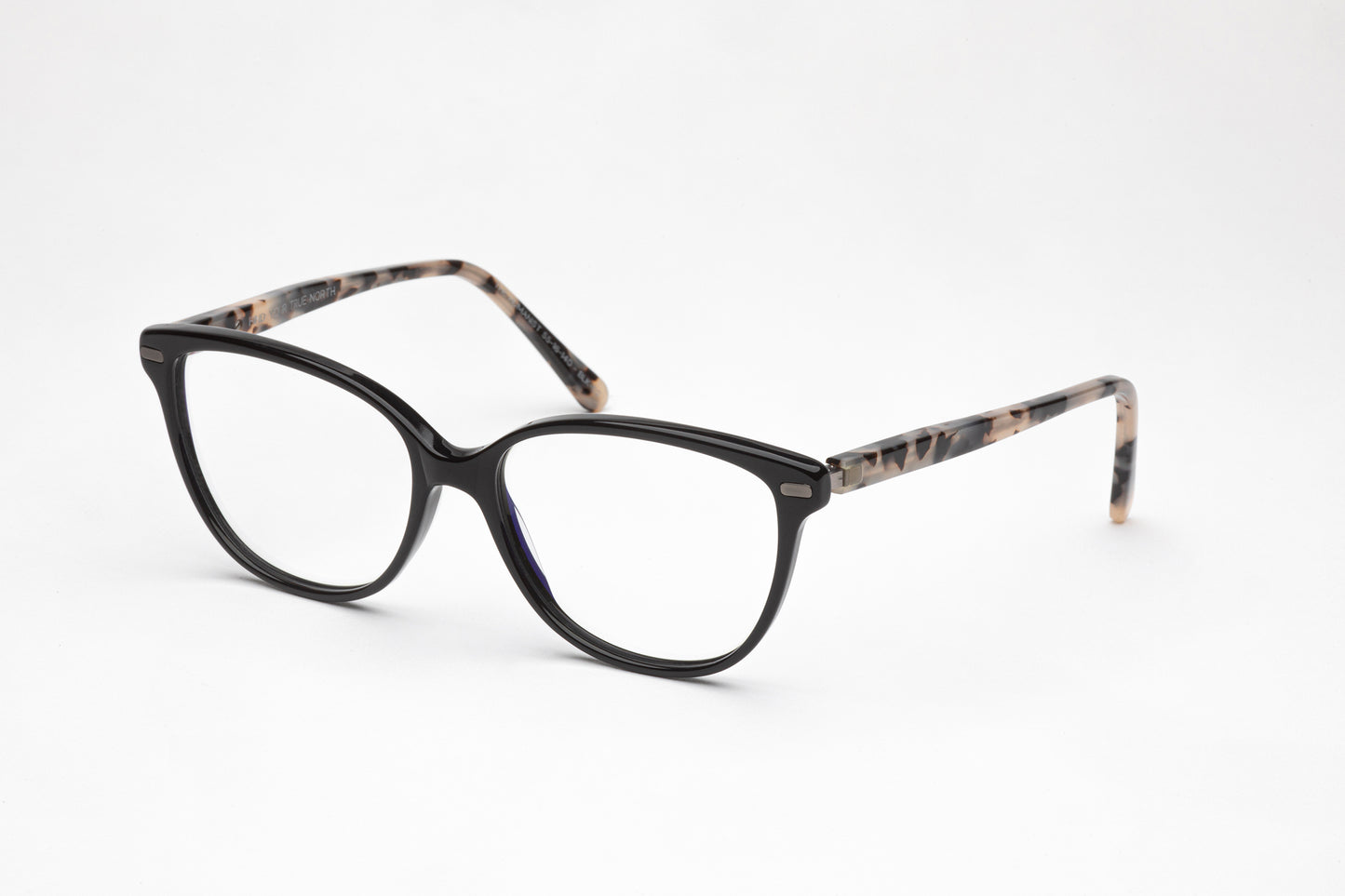 Angled view of The Humanist black acetate glasses frames with tortoiseshell stems